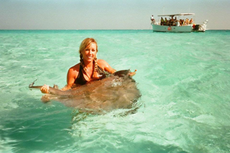 A woman is holding Stingray
