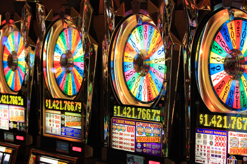 four digital gambling machines