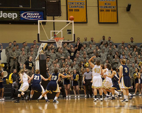A photograph shows a basketball game.